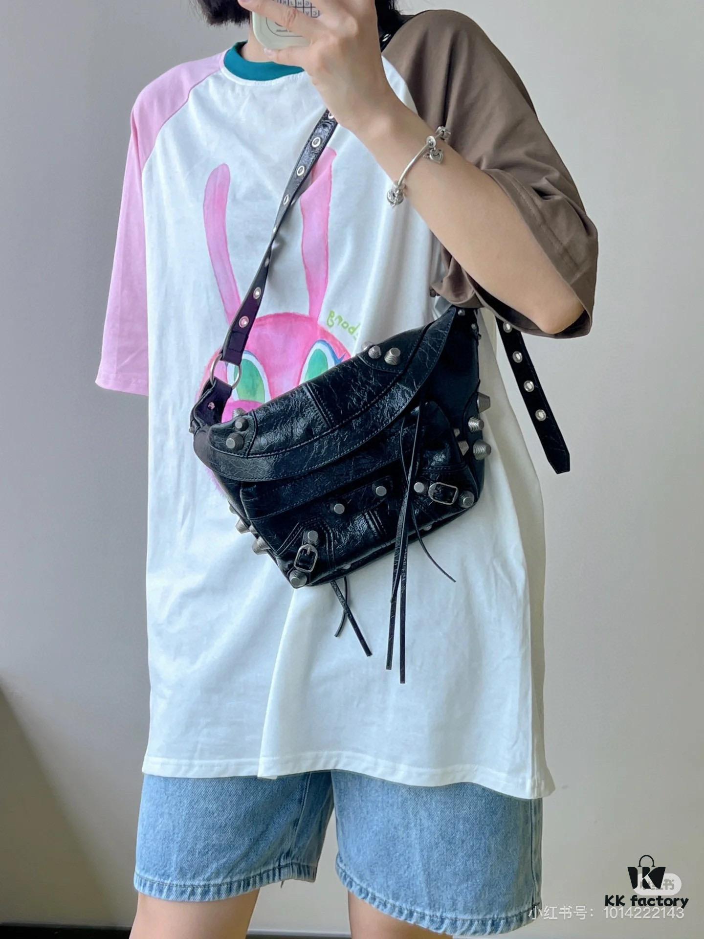 6930e0eb6e68136f4d9b2275 Balenciaga LE CAGOLE MEDIUM BUM BAG IN BLACK TEXTURED LAMB LEATHER
