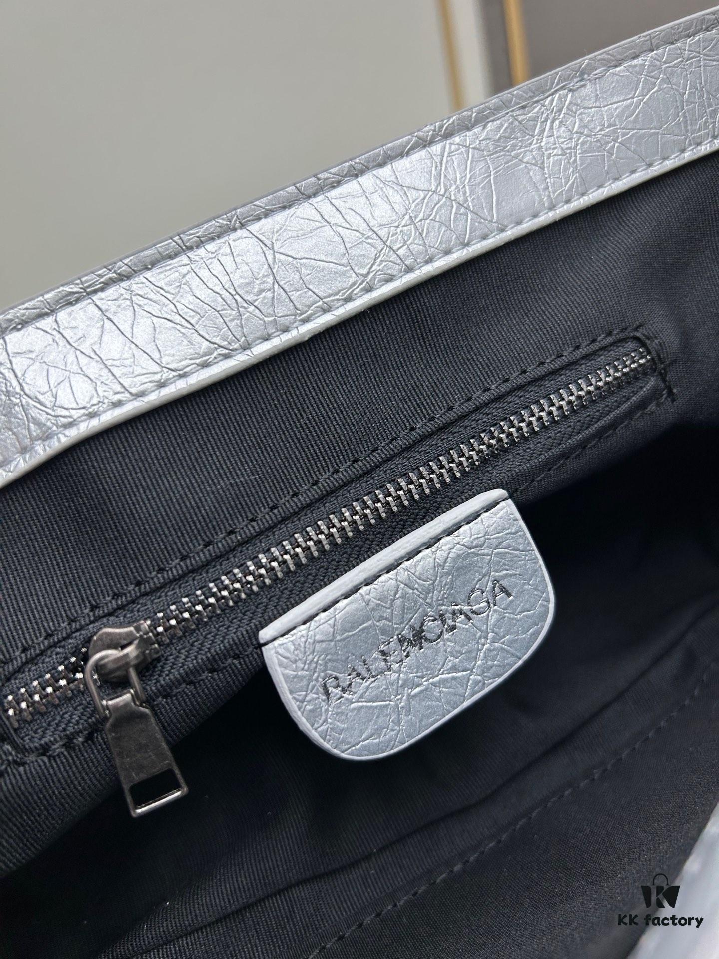 6930e0ed6e68136f4d9b2279 Balenciaga Le Cagole New Sling Bag - French Baguette Style with Minimalist Design