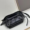 6930e0f06e68136f4d9b227d Balenciaga LE CAGOLE ||| LE CAGOLE MEN Medium Waist Bag in Black Fine-Grain Lambskin