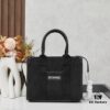 6930e1746e68136f4d9b231e Small Balenciaga Hardware Tote – A modern interpretation of a canvas bag originally developed for the Marine Corps, crafted from organic cotton canvas with structured design and interior pocket, spacious and ultra-lightweight, effortlessly stylish for any occasion.