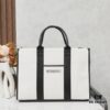 6930e17b6e68136f4d9b2328 Large Balenciaga Hardware Tote – A modern interpretation of a canvas bag originally developed for the Marine Corps