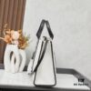 6930e17e6e68136f4d9b232c Large Balenciaga Hardware Tote – A modern interpretation of a canvas bag originally developed for the Marine Corps