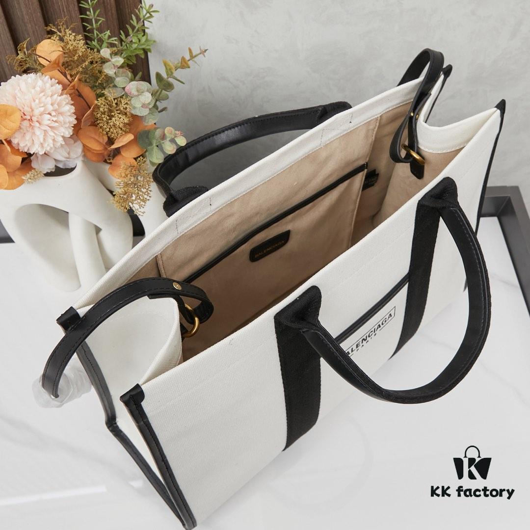 6930e1816e68136f4d9b2333 Large Balenciaga Hardware Tote – A modern interpretation of a canvas bag originally developed for the Marine Corps
