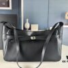 6930e1aa6e68136f4d9b2362 New BALENCIAGA Winter 24 Collection Re-See Shoulder Bucket Bag, Full-Grain Leather, Minimalist Luxury Design, Upcycled Motorbike Glove Clutch with Keychain Closure, Effortlessly Chic Look