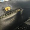 6930e1aa6e68136f4d9b2363 New Balenciaga Winter 24 Collection Re-see Shoulder Bucket Bag, Full-Grain Leather, Minimalist Luxury Design, Upcycled Motorcycle Glove Handbag with Keychain Closure, Effortlessly Chic Look