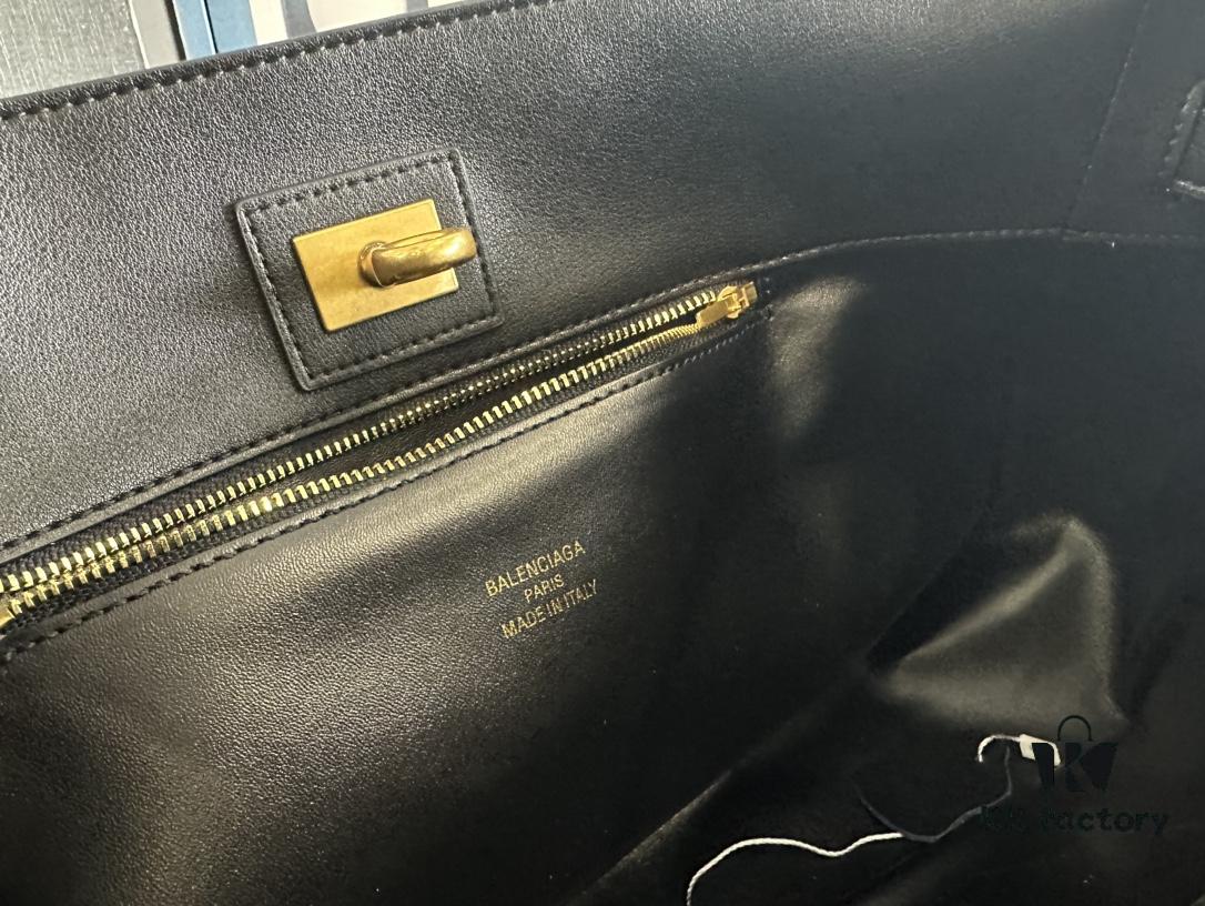 6930e1aa6e68136f4d9b2363 New Balenciaga Winter 24 Collection Re-see Shoulder Bucket Bag, Full-Grain Leather, Minimalist Luxury Design, Upcycled Motorcycle Glove Handbag with Keychain Closure, Effortlessly Chic Look