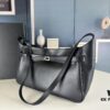 6930e1ac6e68136f4d9b2364 New BALENCIAGA Winter 24 Collection Re-See Shoulder Bucket Bag, Full-Grain Leather, Minimalist Luxury Design, Upcycled Motorbike Glove Clutch with Keychain Closure, Effortlessly Chic Look