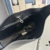6930e1af6e68136f4d9b2369 New BALENCIAGA Winter 24 Collection Re-See Shoulder Bucket Bag, Full-Grain Leather, Minimalist Luxury Design, Upcycled Motorbike Glove Clutch with Keychain Closure, Effortlessly Chic Look