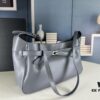 6930e1b36e68136f4d9b236d New Balenciaga Winter 24 Collection Re-See Shoulder Bucket Bag, Full-Grain Leather, Minimalist Luxury Design, Upcycled Motorbike Glove Clutch with Keychain Closure, Effortlessly Chic Look