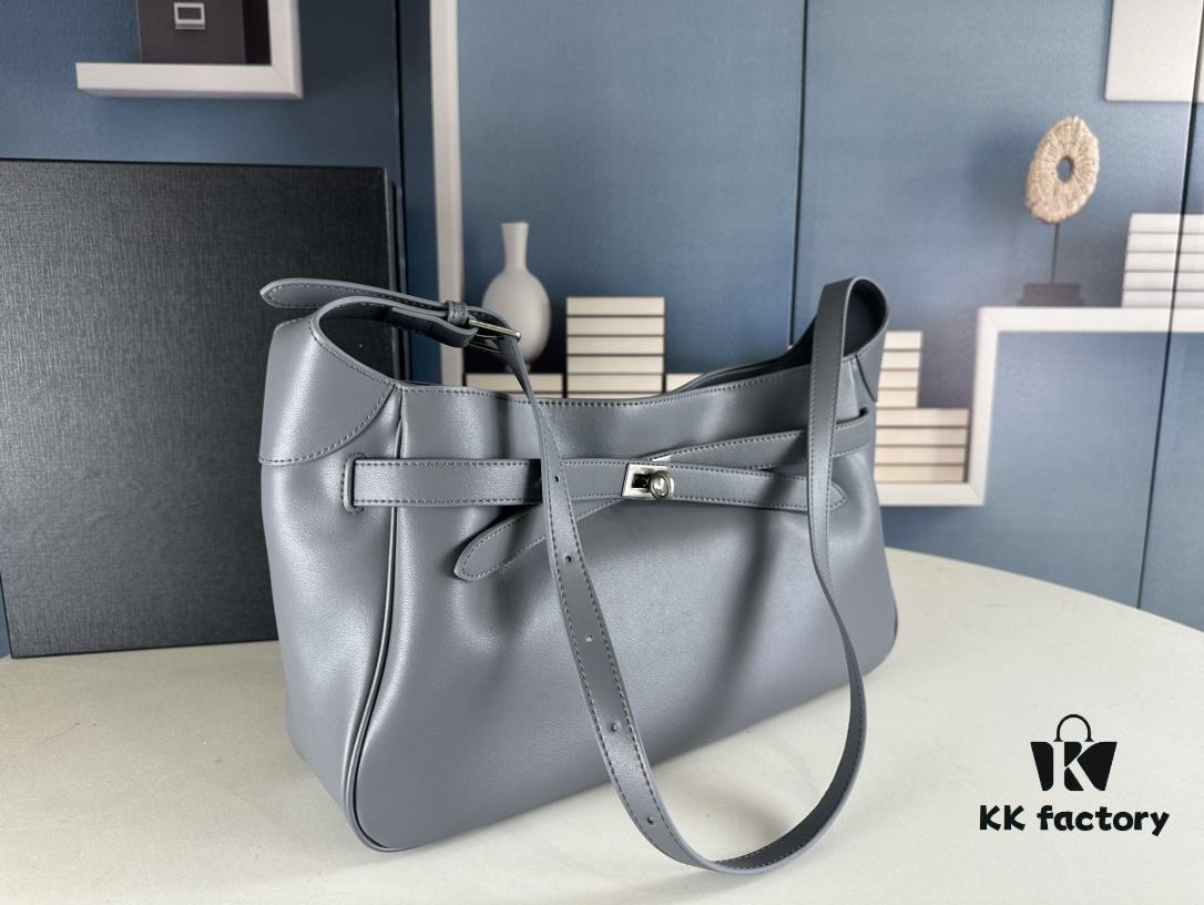 6930e1b36e68136f4d9b236d New Balenciaga Winter 24 Collection Re-See Shoulder Bucket Bag, Full-Grain Leather, Minimalist Luxury Design, Upcycled Motorbike Glove Clutch with Keychain Closure, Effortlessly Chic Look