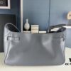 6930e1b46e68136f4d9b236f New Balenciaga Winter 24 Collection Re-See Shoulder Bucket Bag, Full-Grain Leather, Minimalist Luxury Design, Upcycled Motorbike Glove Clutch with Keychain Closure, Effortlessly Chic Look