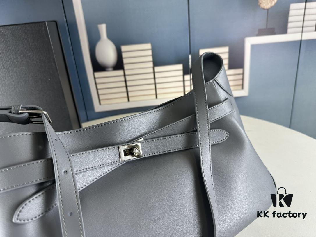 6930e1b56e68136f4d9b2370 New Balenciaga Winter 24 Collection Re-See Shoulder Bucket Bag, Full-Grain Leather, Minimalist Luxury Design, Upcycled Motorbike Glove Clutch with Keychain Closure, Effortlessly Chic Look