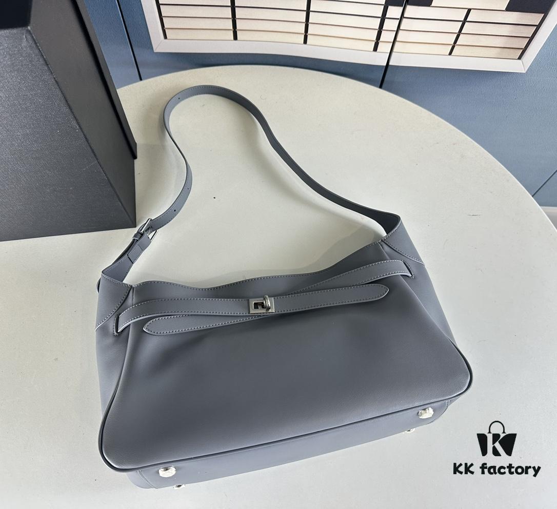 6930e1b86e68136f4d9b2373 New Balenciaga Winter 24 Collection Re-See Shoulder Bucket Bag, Full-Grain Leather, Minimalist Luxury Design, Upcycled Motorbike Glove Clutch with Keychain Closure, Effortlessly Chic Look