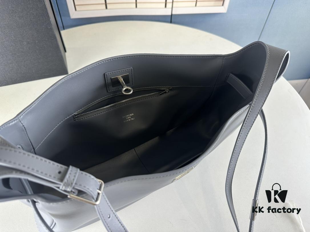6930e1b96e68136f4d9b2374 New Balenciaga Winter 24 Collection Re-See Shoulder Bucket Bag, Full-Grain Leather, Minimalist Luxury Design, Upcycled Motorbike Glove Clutch with Keychain Closure, Effortlessly Chic Look