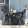 6930e1c16e68136f4d9b237d New Balenciaga Winter 24 Collection Re-see Shoulder Bucket Bag, Full-Grain Leather, Minimalist Luxury Design, Upcycled Motorcycle Glove Handbag with Keychain Closure, Effortlessly Chic Look