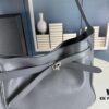 6930e1ca6e68136f4d9b2389 New Balenciaga Winter 24 Collection Re-see Shoulder Bucket Bag, Top Grain Leather, Minimalist Luxury Design, Upcycled Motorcycle Glove Handbag with Keychain Closure, Effortless Chic Style