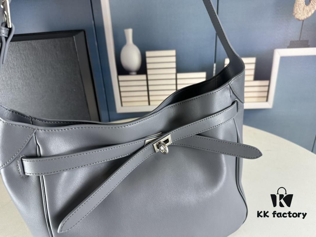 6930e1ca6e68136f4d9b2389 New Balenciaga Winter 24 Collection Re-see Shoulder Bucket Bag, Top Grain Leather, Minimalist Luxury Design, Upcycled Motorcycle Glove Handbag with Keychain Closure, Effortless Chic Style
