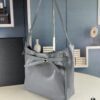 6930e1ca6e68136f4d9b238d New Balenciaga Winter 24 Collection Re-see Shoulder Bucket Bag, Top Grain Leather, Minimalist Luxury Design, Upcycled Motorcycle Glove Handbag with Keychain Closure, Effortless Chic Style