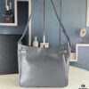6930e1cb6e68136f4d9b238e New Balenciaga Winter 24 Collection Re-see Shoulder Bucket Bag, Top Grain Leather, Minimalist Luxury Design, Upcycled Motorcycle Glove Handbag with Keychain Closure, Effortless Chic Style