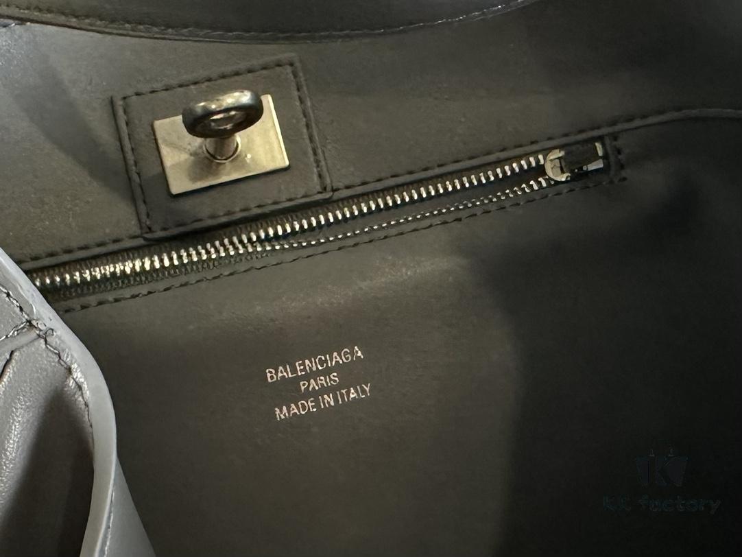 6930e1cc6e68136f4d9b238f New Balenciaga Winter 24 Collection Re-see Shoulder Bucket Bag, Top Grain Leather, Minimalist Luxury Design, Upcycled Motorcycle Glove Handbag with Keychain Closure, Effortless Chic Style