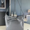 6930e1cc6e68136f4d9b2390 New Balenciaga Winter 24 Collection Re-see Shoulder Bucket Bag, Top Grain Leather, Minimalist Luxury Design, Upcycled Motorcycle Glove Handbag with Keychain Closure, Effortless Chic Style