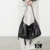 6930e2126e68136f4d9b23f2 New BALENCIAGA Winter 24 Collection Re-See Shoulder Bucket Bag, Full-Grain Leather, Minimalist Luxury Design, Upcycled Motorcycle Glove Clutch with Keychain Closure, Effortlessly Chic Oversized Look