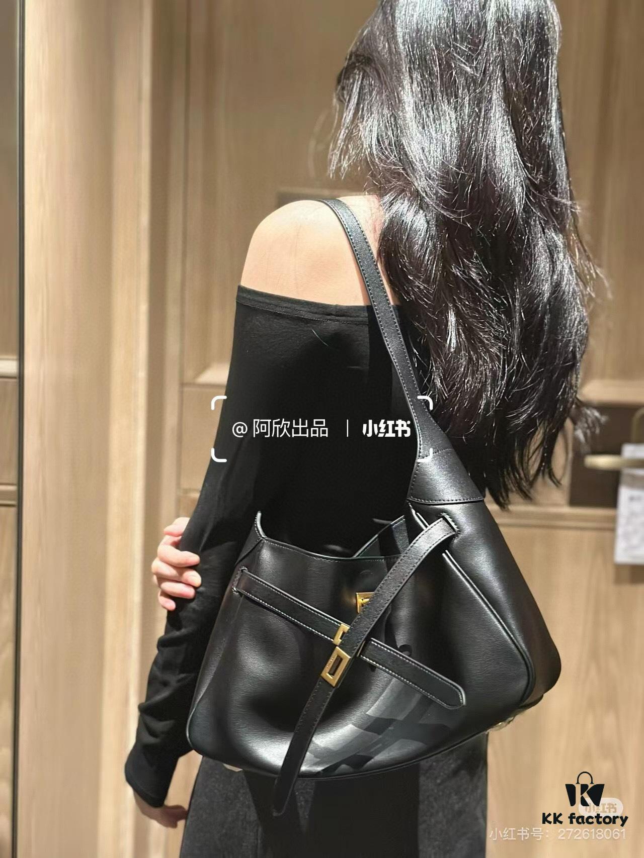6930e2136e68136f4d9b23f3 New BALENCIAGA Winter 24 Collection Re-See Shoulder Bucket Bag, Full-Grain Leather, Minimalist Luxury Design, Upcycled Motorcycle Glove Clutch with Keychain Closure, Effortlessly Chic Oversized Look