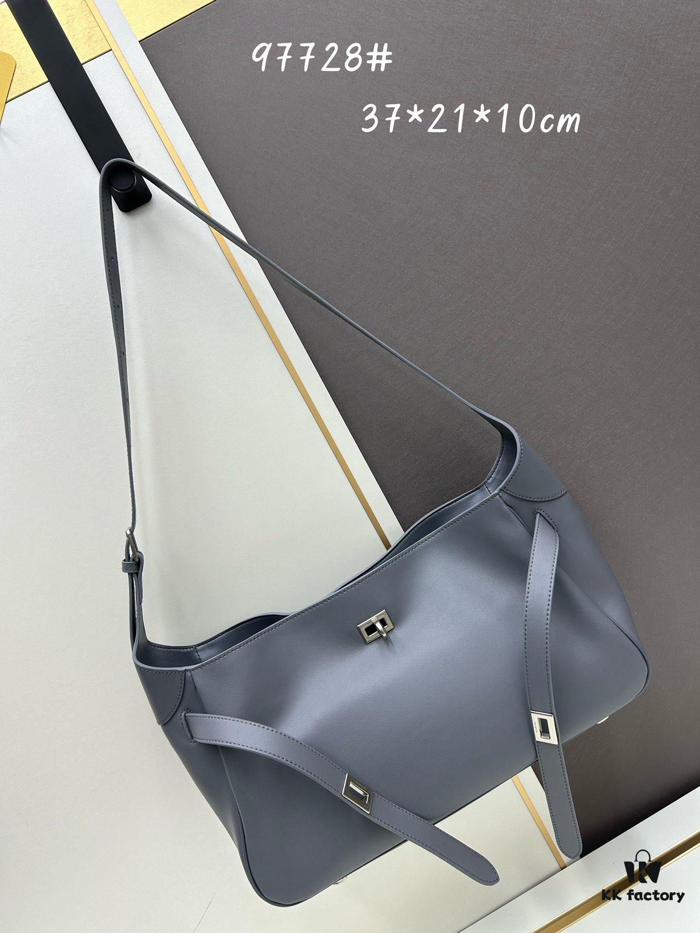 6930e2266e68136f4d9b2409 New BALENCIAGA Winter 24 Collection Re-See Shoulder Bucket Bag, Full-Grain Leather, Minimalist Luxury Design, Upcycled Motorcycle Glove Handbag with Keychain Closure, Elegant and Sophisticated Look