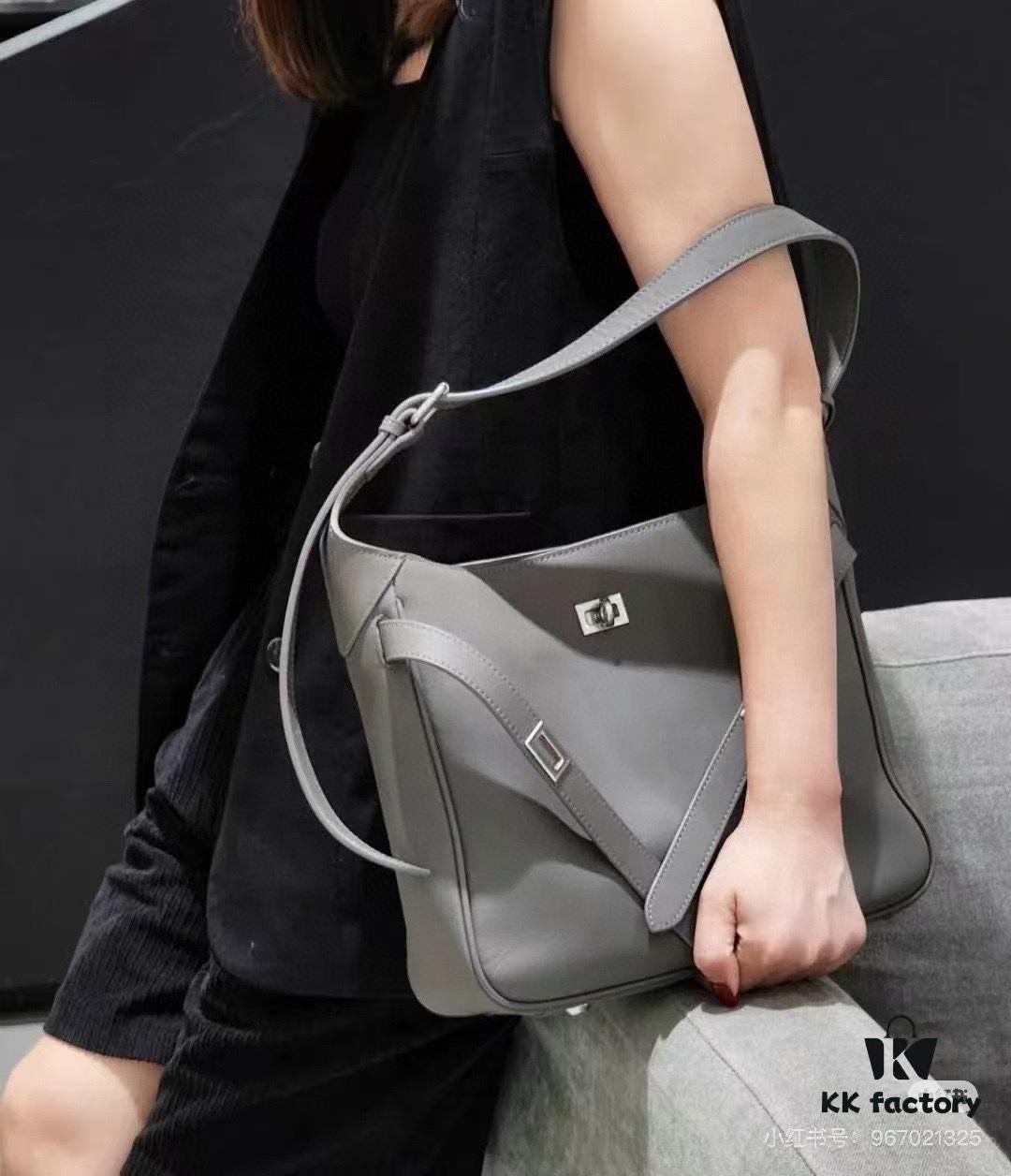 6930e22c6e68136f4d9b2412 New Balenciaga Winter 24 Collection Re-See Shoulder Bucket Bag, Top-Grain Leather, Minimalist Luxury Design, Upcycled Motorbike Glove Handbag with Keychain Closure, Effortless Chic Style