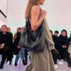 6930e22c6e68136f4d9b2413 New Balenciaga Winter 24 Collection Re-See Shoulder Bucket Bag, Top-Grain Leather, Minimalist Luxury Design, Upcycled Motorbike Glove Handbag with Keychain Closure, Effortless Chic Style