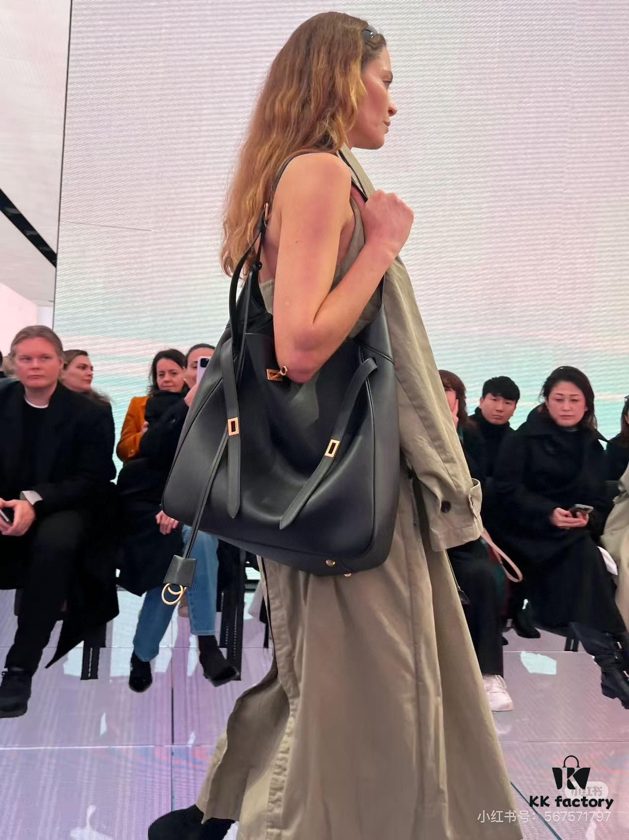 6930e22c6e68136f4d9b2413 New Balenciaga Winter 24 Collection Re-See Shoulder Bucket Bag, Top-Grain Leather, Minimalist Luxury Design, Upcycled Motorbike Glove Handbag with Keychain Closure, Effortless Chic Style