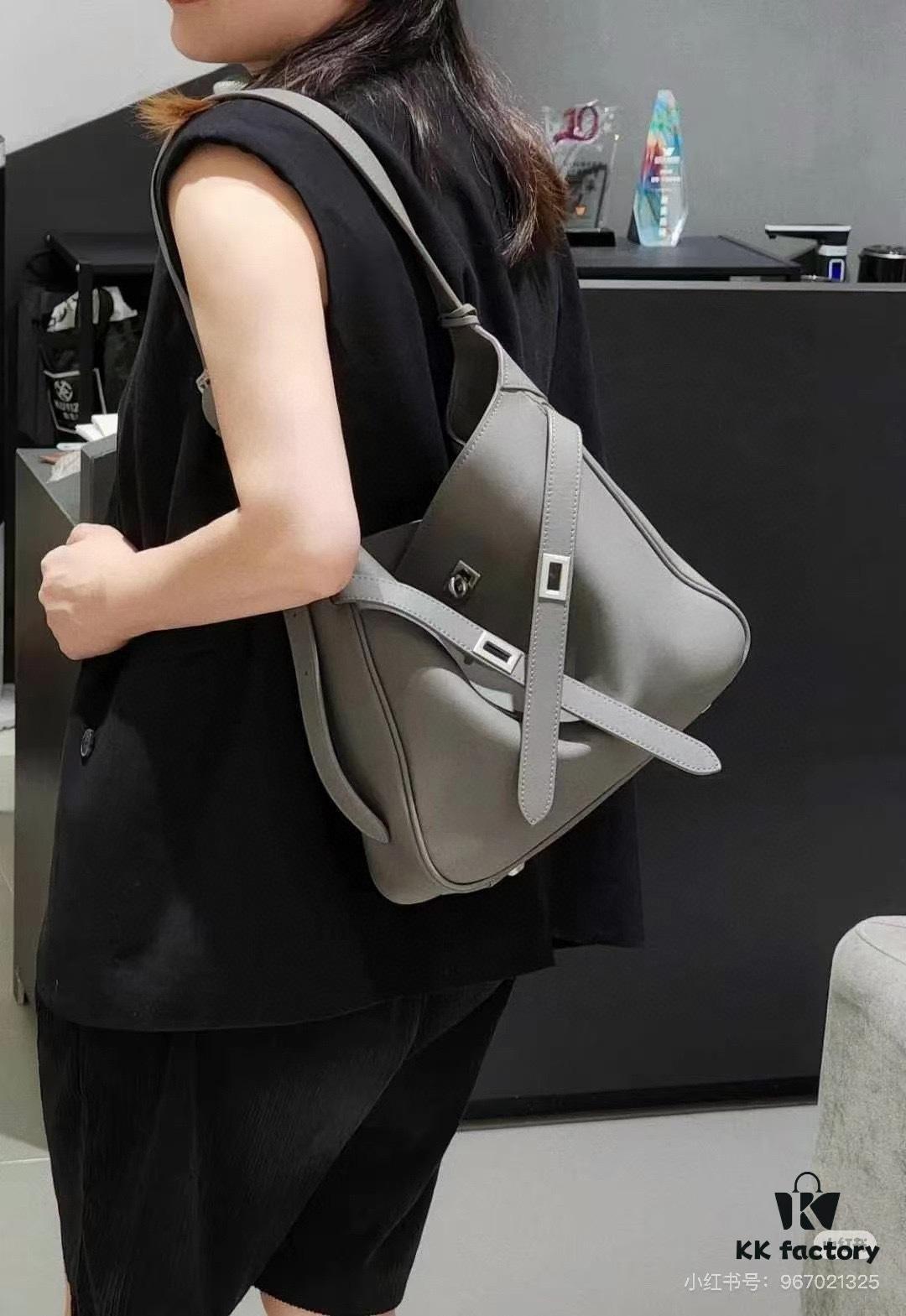 6930e22d6e68136f4d9b2415 New Balenciaga Winter 24 Collection Re-See Shoulder Bucket Bag, Top-Grain Leather, Minimalist Luxury Design, Upcycled Motorbike Glove Handbag with Keychain Closure, Effortless Chic Style
