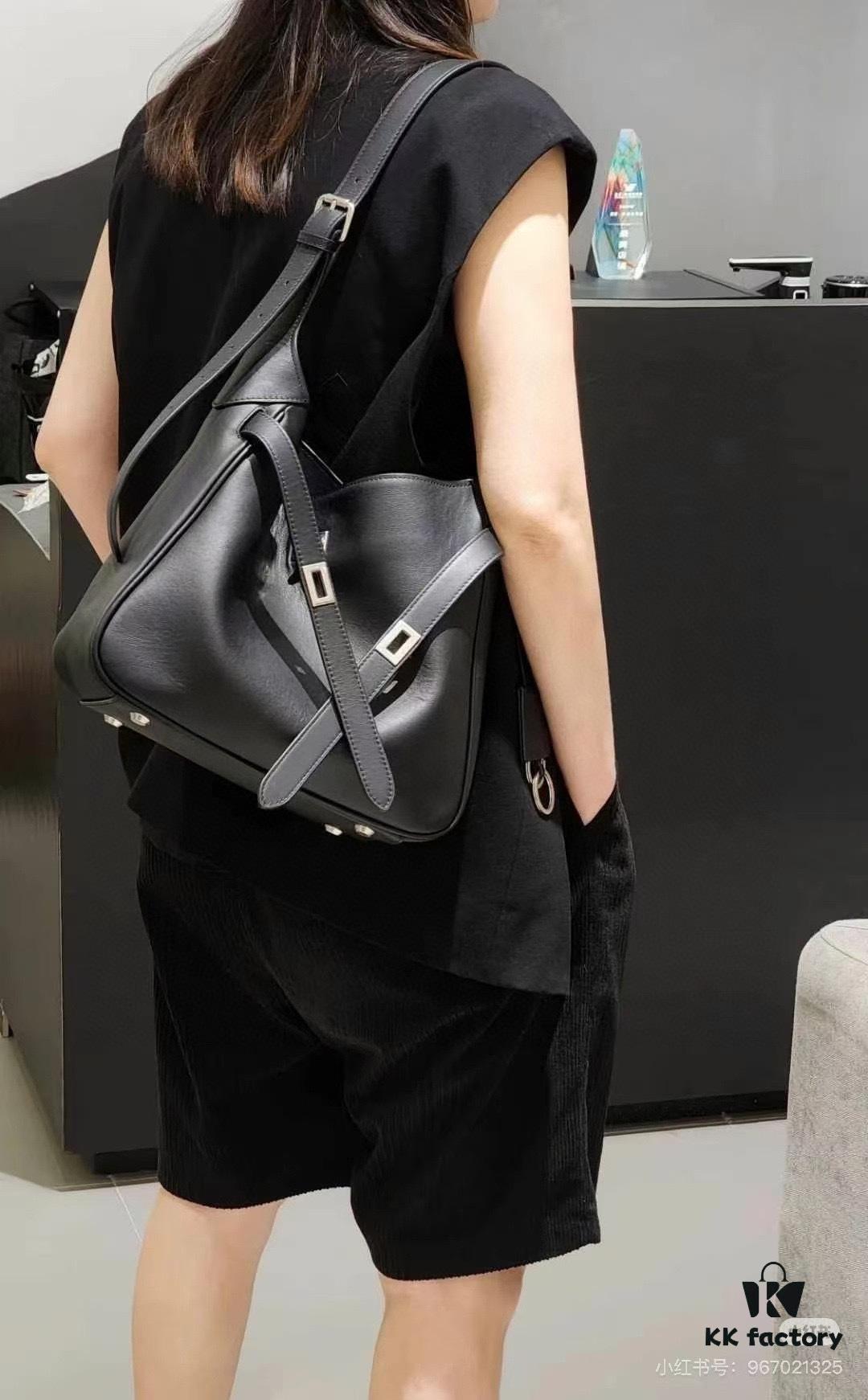 6930e22e6e68136f4d9b2416 New Balenciaga Winter 24 Collection Re-See Shoulder Bucket Bag, Top-Grain Leather, Minimalist Luxury Design, Upcycled Motorbike Glove Handbag with Keychain Closure, Effortless Chic Style