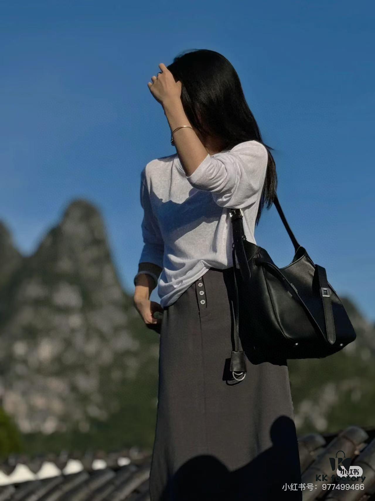 6930e2316e68136f4d9b2419 New Balenciaga Winter 24 Collection Re-See Shoulder Bucket Bag, Top-Grain Leather, Minimalist Luxury Design, Upcycled Motorbike Glove Handbag with Keychain Closure, Effortless Chic Style