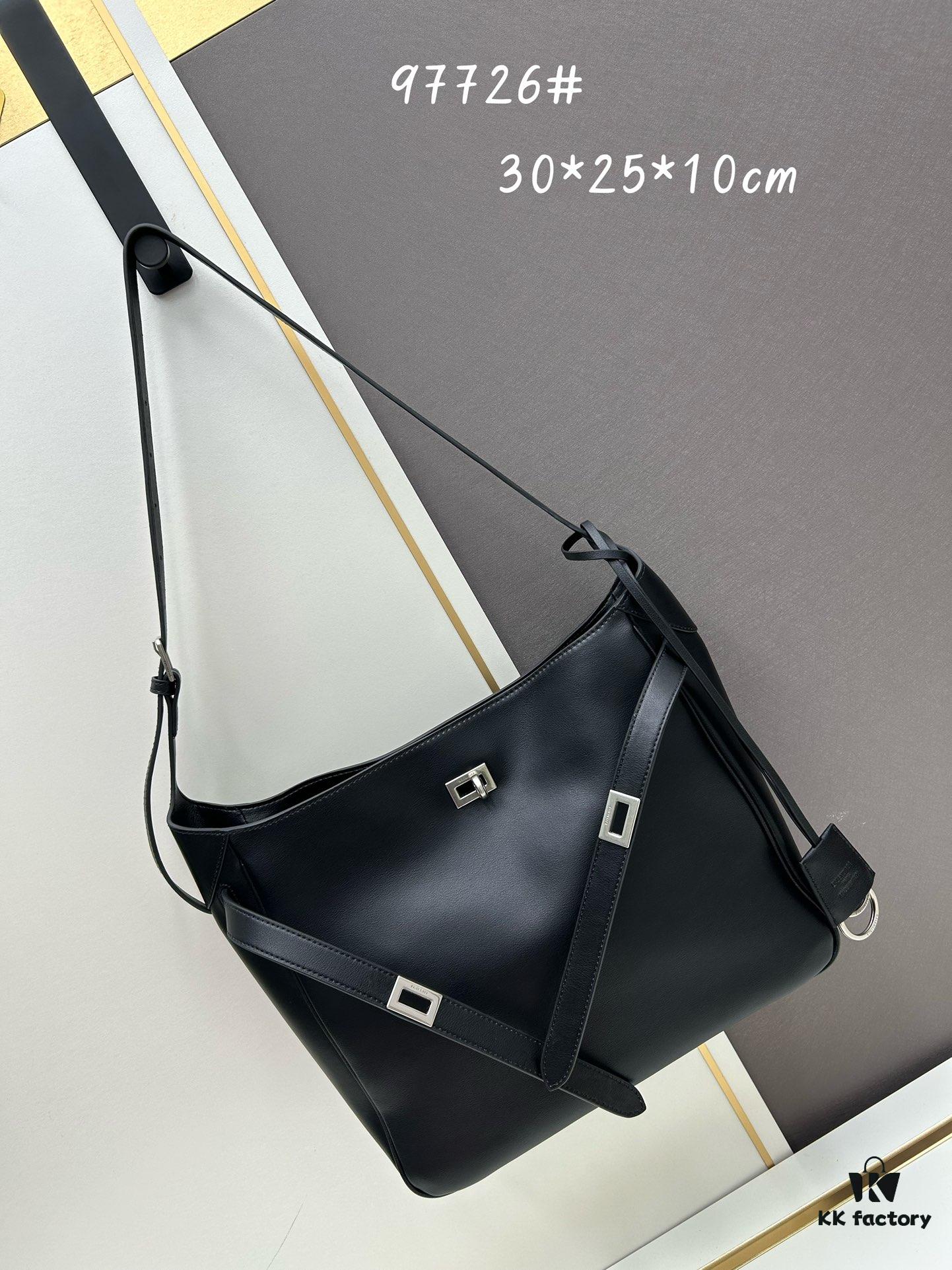 6930e2336e68136f4d9b241c New Balenciaga Winter 24 Collection Re-See Shoulder Bucket Bag, Full-Grain Leather, Minimalist Luxury Design, Upcycled Motorbike Glove Handbag with Keyring Closure, Effortlessly Chic Oversized Style