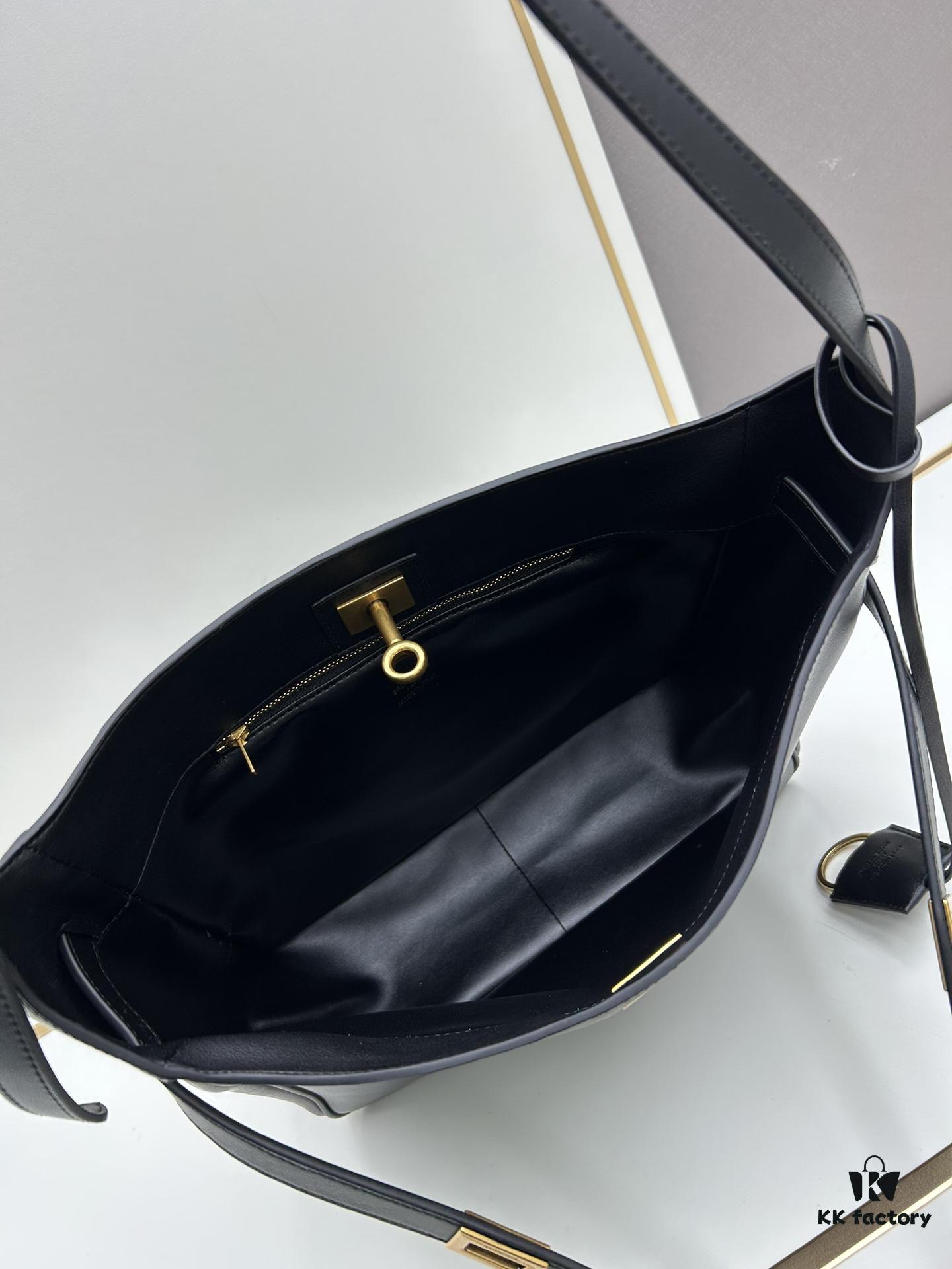 6930e23a6e68136f4d9b2425 New Balenciaga Winter 24 Collection Re-see Handbag, Shoulder Bucket Bag in Full-Grain Leather, Minimalist Luxury Design Upcycled from Motorcycle Gloves with Keychain Closure, Effortlessly Chic Oversized Look