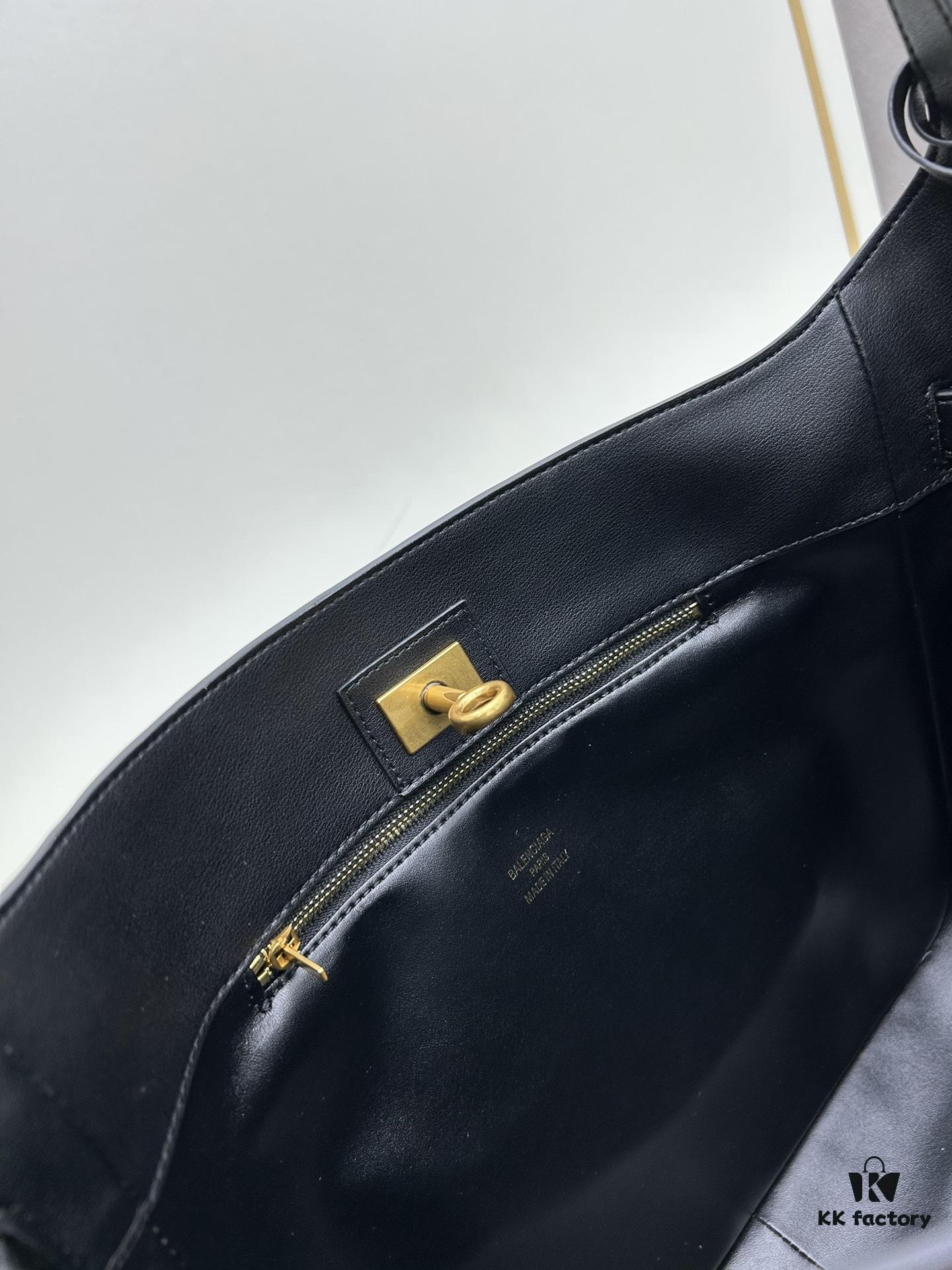6930e23b6e68136f4d9b2426 New Balenciaga Winter 24 Collection Re-see Handbag, Shoulder Bucket Bag in Full-Grain Leather, Minimalist Luxury Design Upcycled from Motorcycle Gloves with Keychain Closure, Effortlessly Chic Oversized Look