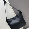 New Balenciaga Winter 24 Collection Re-see Shoulder Bucket Bag, Full-Grain Leather, Minimalist Luxury Design, Upcycled Motorcycle Glove Handbag with Keychain Closure, Effortless Chic Style
