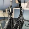 6930e46c6e68136f4d9b278d Mini Crocodile Texture - Balenciaga Le Cagole Half-Moon Crossbody Bag