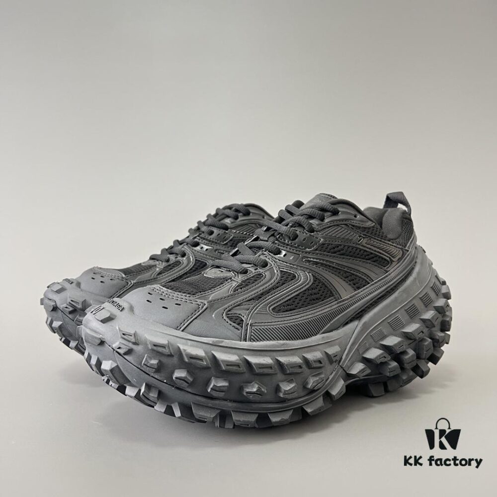6930e8a36e68136f4d9b2eac BALENCIAGA Defender Rubber Platform Sneakers Unisex Black Tire-Derived Design