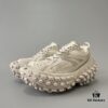 6930e8a96e68136f4d9b2eb5 BALENCIAGA Defender Beige Rubber Platform Sneakers Unisex