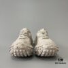 6930e8ab6e68136f4d9b2eb6 BALENCIAGA Defender Beige Rubber Platform Sneakers Unisex