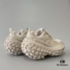6930e8ac6e68136f4d9b2eb9 BALENCIAGA Defender Beige Rubber Platform Sneakers Unisex