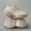 6930e8ad6e68136f4d9b2ebb BALENCIAGA Defender Beige Rubber Platform Sneakers Unisex