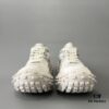 6930e8b56e68136f4d9b2ec8 BALENCIAGA Defender Silver Tire Dad Sneakers Unisex