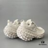 6930e8b76e68136f4d9b2ecc BALENCIAGA Defender Silver Tire Dad Sneakers Unisex