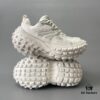 6930e8b96e68136f4d9b2ecf BALENCIAGA Defender Silver Tire Dad Sneakers Unisex