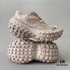 6930e8c86e68136f4d9b2eea BALENCIAGA Defender Brown Tire Rubber Platform Sneakers Unisex