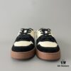 6930ead86e68136f4d9b317a FENDI Match Unisex Retro Patchwork Leather Sneakers in Black and White