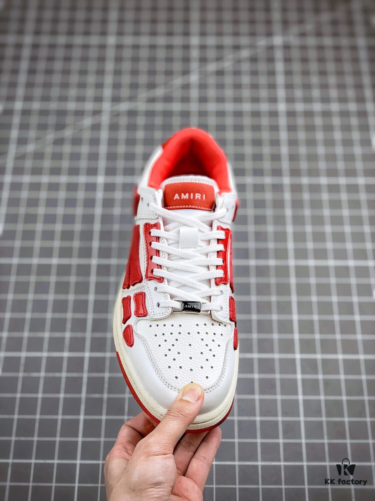 6930ed046e68136f4d9b34a3 AMIRI Skeleton High Low-Top Sneakers